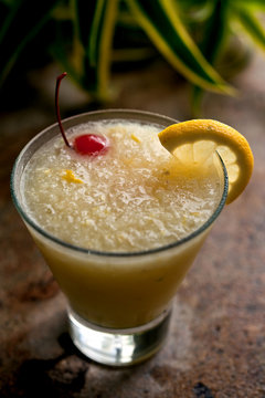 Close up of frozen lemon crush cocktail served in glass