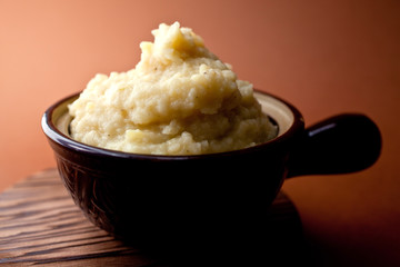 Close up of potato, celery and apple puree served in bowl