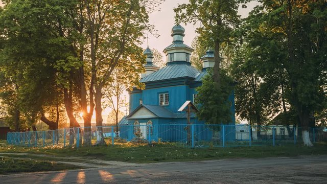 Staraya Belitsa, (Uritskiy Sel'sovet), Gomel Region, Belarus. Old Wooden Orthodox Church Of St Nicholas The Wonderworker During Summer Sunset. Orthodox Church Of St. Nikolaya Chudotvortsa