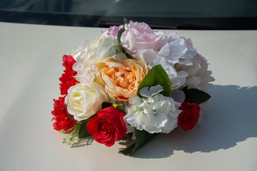 wedding  bride's car decorated with flowers