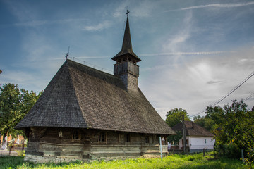 Fototapeta na wymiar Wooden church from Vălenii Șomcutei, Șomcuta Mare city, Maramureș county,ROMANIA. 2019