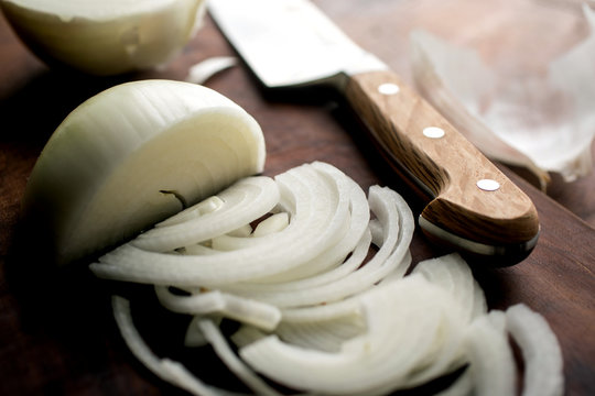 Close up of sliced onion on cutting board
