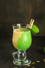 green smoothie (avocado, banana, spinach and other ingredients) menu. top food background. copy space