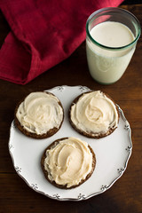 Close up of cookies and milk on table