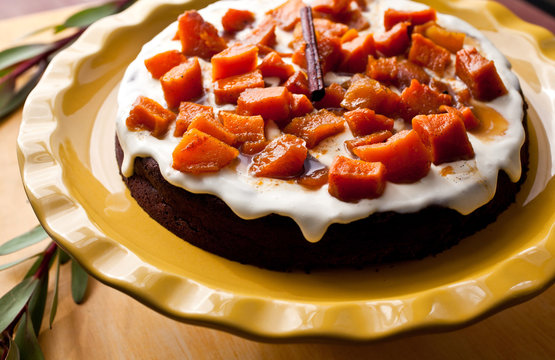 Close up of chocolate souffle cake with candied squash compote