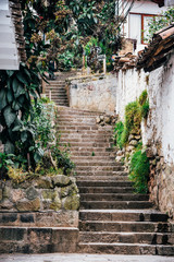 Fototapeta na wymiar Stairwell alley in Cusco, Peru 