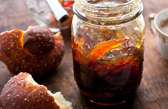 Close up of nectarine lemon verbena jam with bread on table