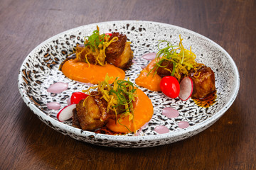 Baked pork with carrot sauce