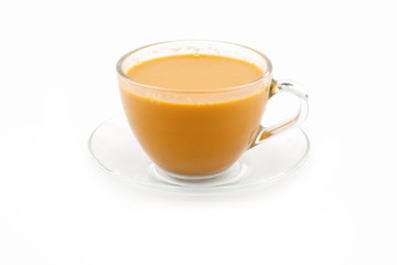 hot tea with milk in glass isolated on white background