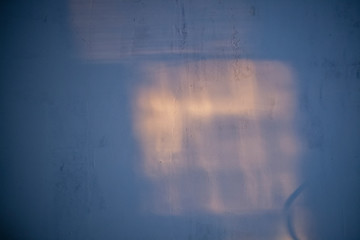 Sunlight on the wall. Light in the morning on the wall.