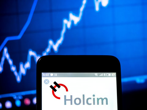  Kiev, Ukraine, March 28, 2019, illustrative editorial. Photo illustration a Holcim Ltd. logo seen displayed on a smart phone.