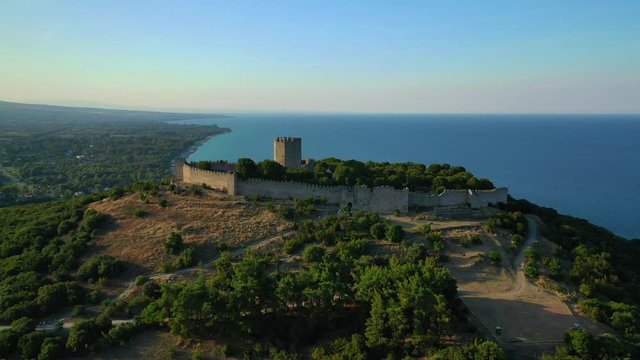 Aerial drone view video of iconic and historic medieval castle of Platamonas built in the slopes of Mount Olympus in Pieria area, North Greece