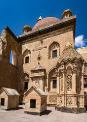 Dogubayazıt, Turkey: the courtyard with the Tomb and main dome of Ishak Pasha Palace, semi-ruined palace of Ottoman period (1685-1784), one of the most magnificent historical buildings of the country
