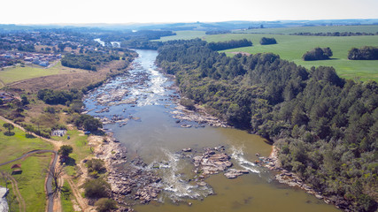 Flight over the Tibagi river in the Tibagi city of Parana state, Brazil.