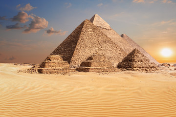 Fototapeta na wymiar Famous Pyramids of Giza, beautiful sunset photo