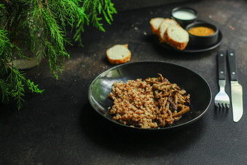 buckwheat with mushrooms (buckwheat porridge, no meat) vegetarian menu. top food background. copy space
