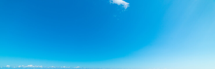 Blue sky with small clouds