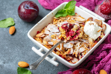 Red plum crumble with crunchy oatmeal and almond.