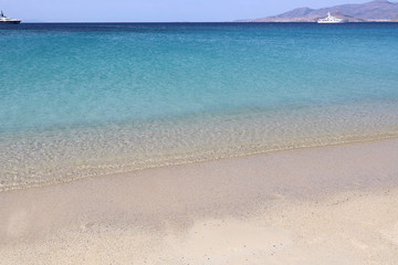 Turquoise Aegean Sea and clear beach at Agios Prokopios, Naxos, Greek Islands
