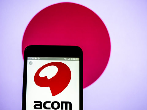  Kiev, Ukraine, March 16, 2019, illustrative editorial. Acom company logo seen displayed on smart phone.
