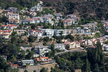 Fototapeta na wymiar Large hillside homes near Los Angeles in scenic Glendale, California.