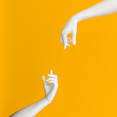 Abstract Hand pose like picking something isolated on yellow. 3d illustration