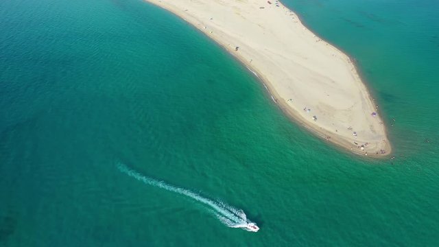 Aerial drone video of iconic Possidi paradise sandy turquoise beach and Peninsula in Kassandra, Halkidiki, North Greece