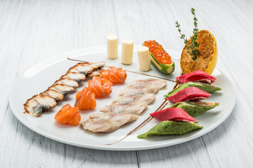 Fish set of salmon caviar and several types of fish