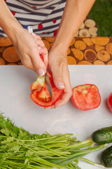 Preparation of salad of fresh vegetables and herbs