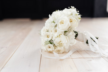 white bride's bouquet. bouquet with peonies and peony rose