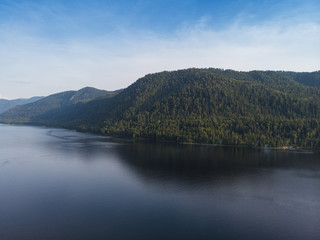 Aerial view on Teletskoye lake in Altai mountains, Siberia, Russia. Drone shot. Beauty summer day.