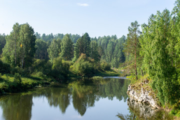 Fototapeta na wymiar calm river on a summer day