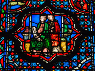 Fototapeta na wymiar Stained glass window in Poissy collegiate church, Paris, France