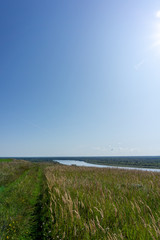 landscape with river and blue sky