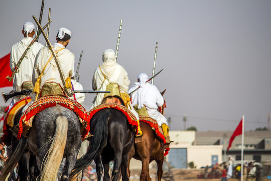 Tbourida Fantasia Morocco Traditional Festival of horses ( Knights on horses with arms show )
