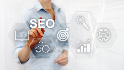 SEO - Search engine optimization, Digital marketing and internet technology concept on blurred background.