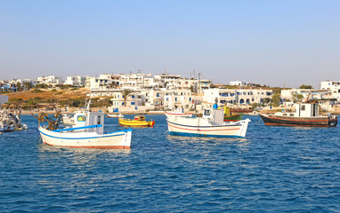 Fototapeta na wymiar landscape of Ano Koufonisi island Cyclades Greece - traditional fishing boats at the harbor