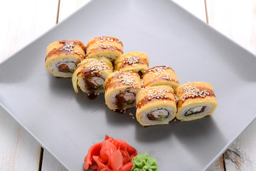 Fried sushi roll with eel and japanese omelette
