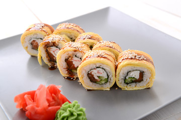 Fried sushi roll with eel and japanese omelette