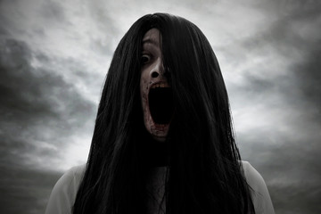 Scary bloody ghost woman screaming
