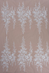 Texture lace fabric. lace on white background studio. thin fabric made of yarn or thread. a...
