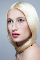 Young beautiful blonde woman with natural makeup