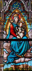 Obraz na płótnie Canvas Kosice, Slovakia. 2019/7/5. Stained glass window depicting the Virgin Mary with the Infant Jesus and King Saint Stephen I. in the Cathedral of St Elisabeth (Dom Svatej Alzbety).