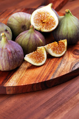 Fresh figs. Food Photo. whole and sliced figs on rustic background.