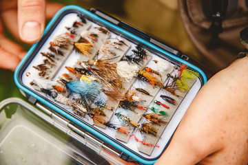 Box flies for fly fishing in hand fisher