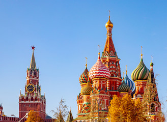 Spasskaya Tower Kremlin and Saint Basil Cathedral Red Square in Moscow, Russia autumn