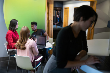 Group of people working in modern office space