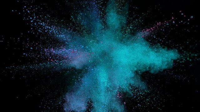 Super Slowmotion Shot of Color Powder Explosion Isolated on Black Background at 1000fps. Shooted with High Speed Cinema Camera at 4K.