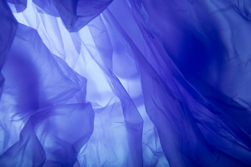 Blue plastic bag texture. Blue silk background