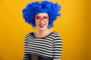 Fun and colorful portrait of woman with blue wig